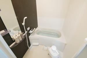 Koupelna v ubytování フォルモント寺田町 202