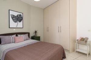 Postel nebo postele na pokoji v ubytování Urban comfortable apartment