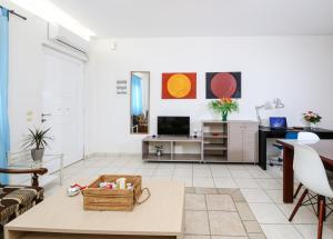 TV a/nebo společenská místnost v ubytování Urban comfortable apartment