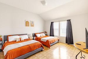 Voodi või voodid majutusasutuse Spacious Home for Large Groups - PS5, Arcade, Gameroom toas