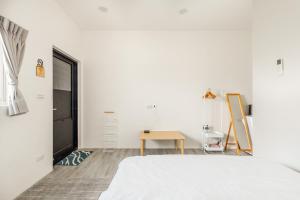 Letto o letti in una camera di 琉意旅宿
