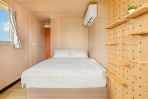 Letto o letti in una camera di 琉意旅宿