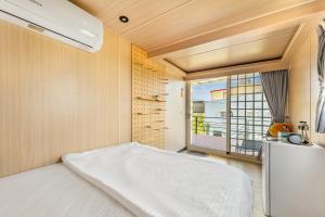 Letto o letti in una camera di 琉意旅宿