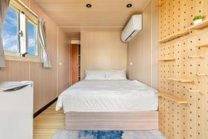 Letto o letti in una camera di 琉意旅宿
