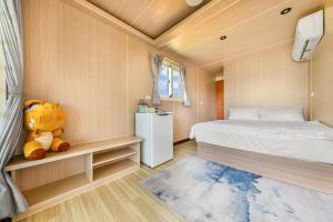 Letto o letti in una camera di 琉意旅宿