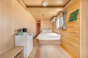 Letto o letti in una camera di 琉意旅宿