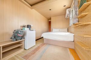 Letto o letti in una camera di 琉意旅宿