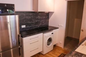 Kuchyň nebo kuchyňský kout v ubytování Metsa 49 Apartment