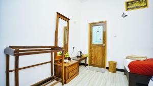Voodi või voodid majutusasutuse SMW Lodge Sigiriya toas