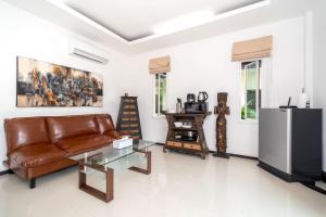 Kuchyň nebo kuchyňský kout v ubytování Oxavia Garden Oasis B3 in Nai Harn with Jaccuzzi + 9 fotografií