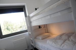 En eller flere senge i et værelse på Ard'cube + 27 billeder