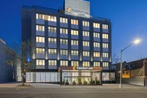 a building with a sign on the front of it at Comfort Inn Prospect Park-Brooklyn in Brooklyn