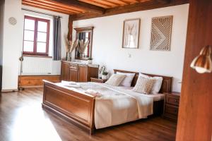 Posteľ alebo postele v izbe v ubytovaní Wellness hotel & minipivovar Kněžínek