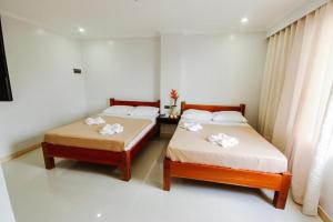 Katil atau katil-katil dalam bilik di Hotel Lapira Vigan