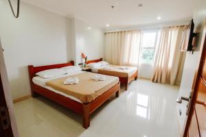 Katil atau katil-katil dalam bilik di Hotel Lapira Vigan