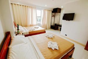Katil atau katil-katil dalam bilik di Hotel Lapira Vigan