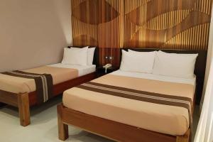 Katil atau katil-katil dalam bilik di Hotel Lapira Vigan