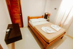 Katil atau katil-katil dalam bilik di Hotel Lapira Vigan