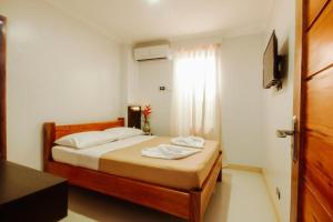 Katil atau katil-katil dalam bilik di Hotel Lapira Vigan