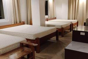 Katil atau katil-katil dalam bilik di Hotel Lapira Vigan