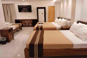 Katil atau katil-katil dalam bilik di Hotel Lapira Vigan