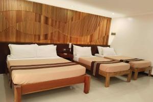 Katil atau katil-katil dalam bilik di Hotel Lapira Vigan