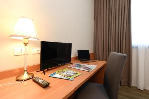TV a/nebo společenská místnost v ubytování Hotel Garda