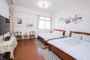 Uma cama ou camas num quarto em Downshifters House