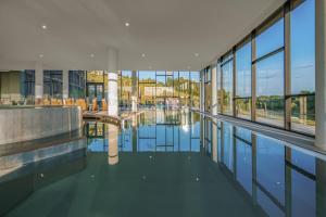 Piscina di Hotel Essence o nelle vicinanze
