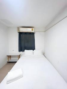 GO INN Siriraj BKK โกอินน์ ศิริราช客房内的一张或多张床位