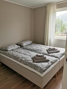 Postel nebo postele na pokoji v ubytování Nature View Apartment in Espeland