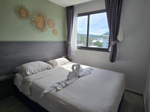Ένα ή περισσότερα κρεβάτια σε δωμάτιο στο Modern Retreat 1- BedT3-529