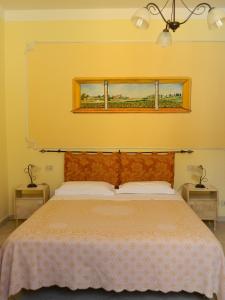 Ліжко або ліжка в номері B&B Casa Fedora