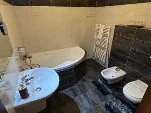 Kúpeľňa v ubytovaní Wellness hotel & minipivovar Kněžínek