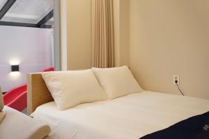 Letto o letti in una camera di Gyeongju Poolvilla Runtoyou