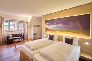 Postel nebo postele na pokoji v ubytování Golfhotel Bodensee by Michael Ritter