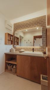 Een badkamer bij 絶景田園と風を感じる癒しの一棟貸しSawah東浪見