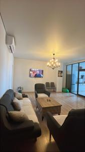 TV a/nebo společenská místnost v ubytování Elene's apartament
