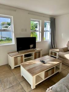 Μια τηλεόραση ή/και κέντρο ψυχαγωγίας στο Myrtle 3 Bed House