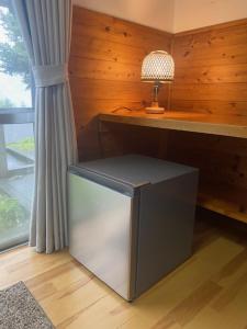 Rúm í herbergi á 山茶小屋 Yamachagoya