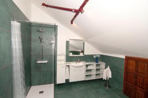 a bathroom with a shower and a sink at Grenko House in Vrata +34 photos