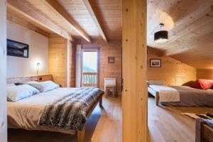 Postel nebo postele na pokoji v ubytování Chalet Bernard