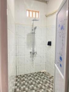 Koupelna v ubytování Fi Hostel Kuta Lombok