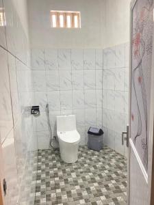 Koupelna v ubytování Fi Hostel Kuta Lombok
