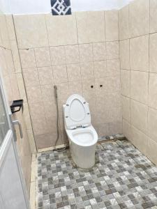 Koupelna v ubytování Fi Hostel Kuta Lombok