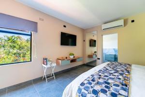 Postel nebo postele na pokoji v ubytování The Outlook @ Victoria Falls + 65 fotografií