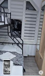 Postel nebo postele na pokoji v ubytování Apartament Suita 10
