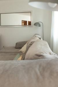 En eller flere senge i et værelse på Casa Marilyn