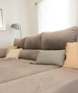 En eller flere senge i et værelse på Casa Marilyn