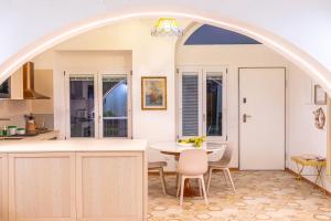 Kuchyň nebo kuchyňský kout v ubytování Cà di Matetti - Esclusivo nel Borgo Saraceno a due passi dal Mare